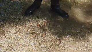 Louboutin leather boots in the river
