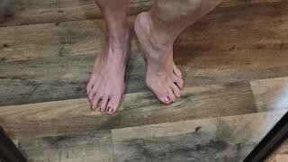 OIled calves in the mirror