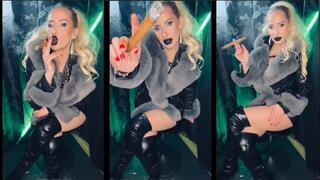Sexy cigar smoking milf- Smoking a cigar in Leather fur and Boots