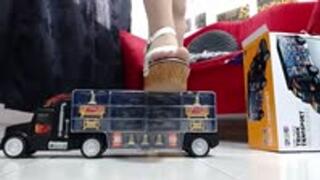 crush a very massive truck with sandals