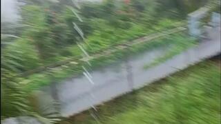 Poking my navel on a rainy day outside