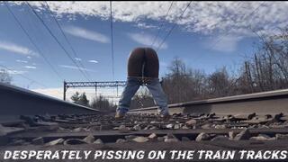 Desperately Pissing On The Train Tracks