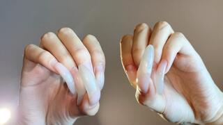 #201 - Close up clawing with long curved nails