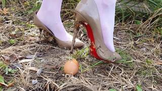 Sexy Aliona crushing 40 eggs with a rodent glue on top of it, by her high heels