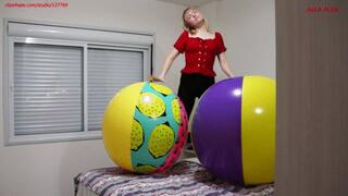 Alla does gymnastics with two huge inflatable beach balls