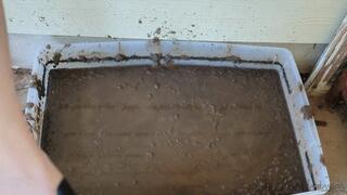 Fifi playing in a bin of mud wearing loafer style mule sandals *NEW midweek replay in case you missed it*