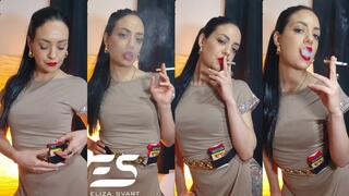 Glamorous smoking in an elegant beige dress