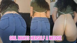 Girl makes herself a wedgie