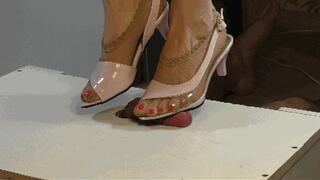 High heels crushing a cock