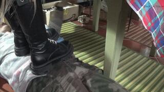 footstool under combat boots