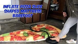 inflated pizza-shaped mattress with bare feet
