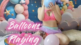 Busty Blonde in Heels Blows, Sits & Pops Party Balloons