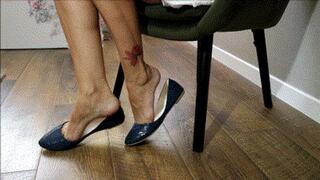 Dark blue ballet flats play , dipping ,dangling MP4