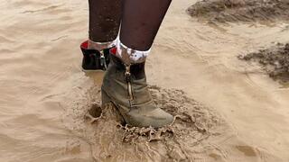 Muddy boots, boots in mud, boots wet, girl walking in mud in white socks and boots, wrecked boots