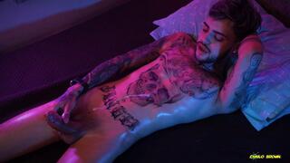 Hot tattooed Twink Jerking His Big Uncut Cock With Oil And Shooting His Cum