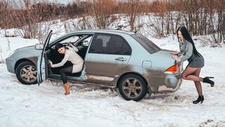 CAR STUCK Girlfriends get stuck in the snow in high heels